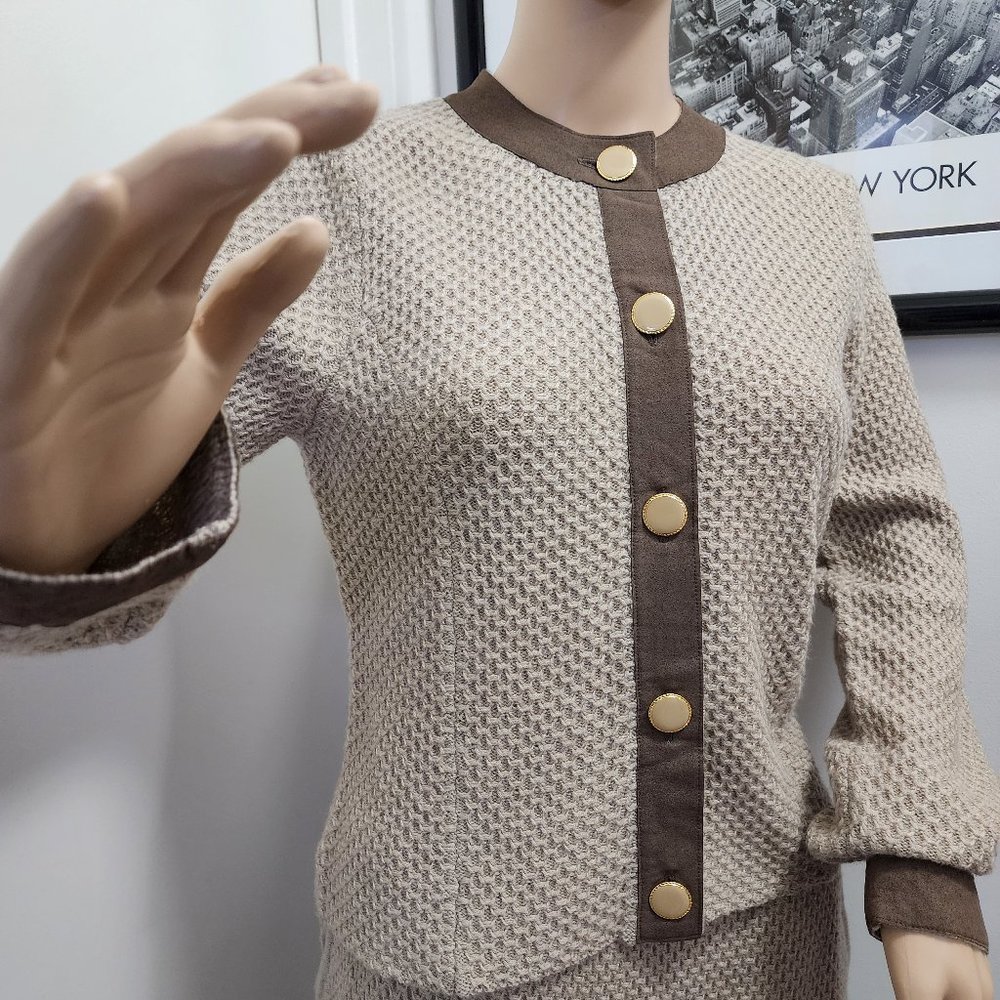 Bloomingdale's (Sutton Studio). Classic skirt suit for spring, fall, winter.